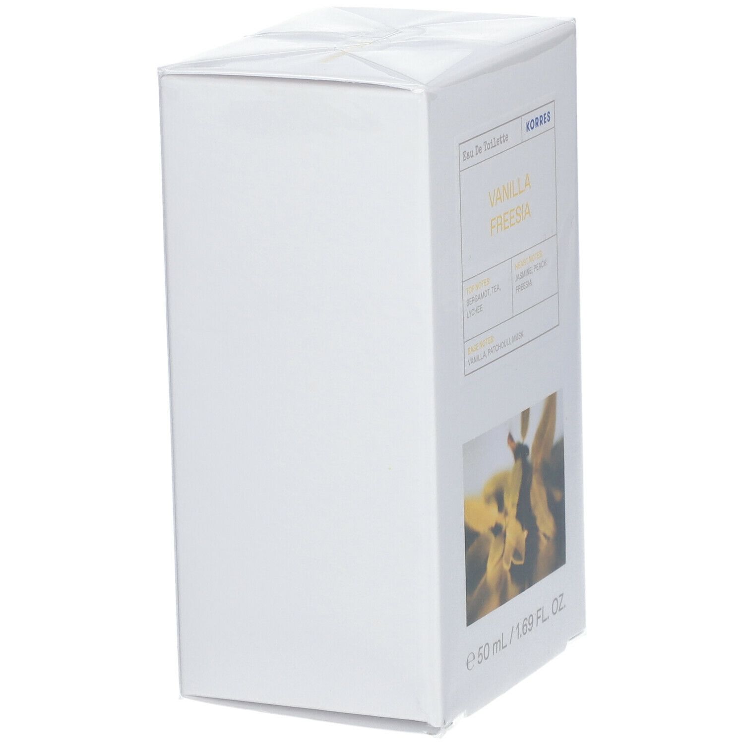 Witte verpakking, vierkant. Productnaam en bloemmotief. Tekst: Eau de Toilette, KORRES, VANILLA FREESIA.