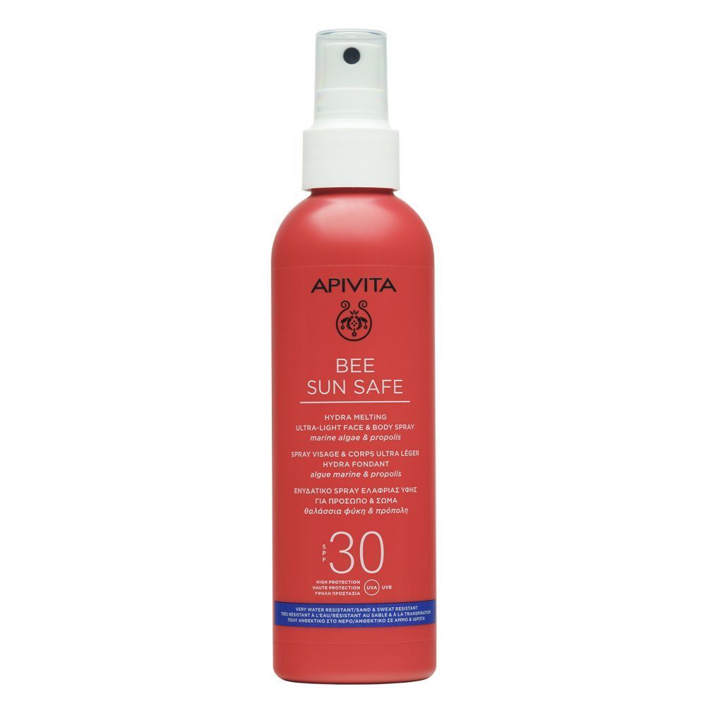 Rode sprayfles met witte sproeikop. Opschrift: APIVITA BEE SUN SAFE, SPF 30.