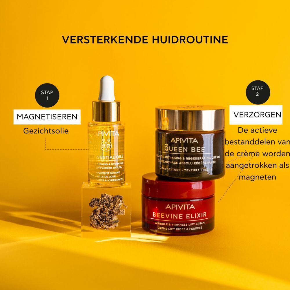 Productfles met gouden dop en pipet. Gele achtergrond.