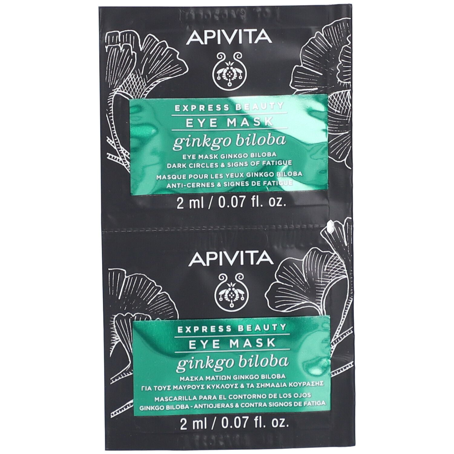 Deux sachets noirs de masque pour les yeux. Inscription : Ginkgo Biloba, cernes & signes de fatigue. 2 ml.