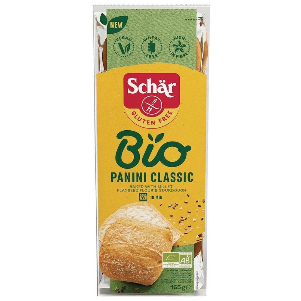 Verpackung mit Schär Bio Panini Classic. Glutenfrei, vegan, mit hohem Ballaststoffgehalt. Gelbe Verpackung mit Produktnamen und Logo.