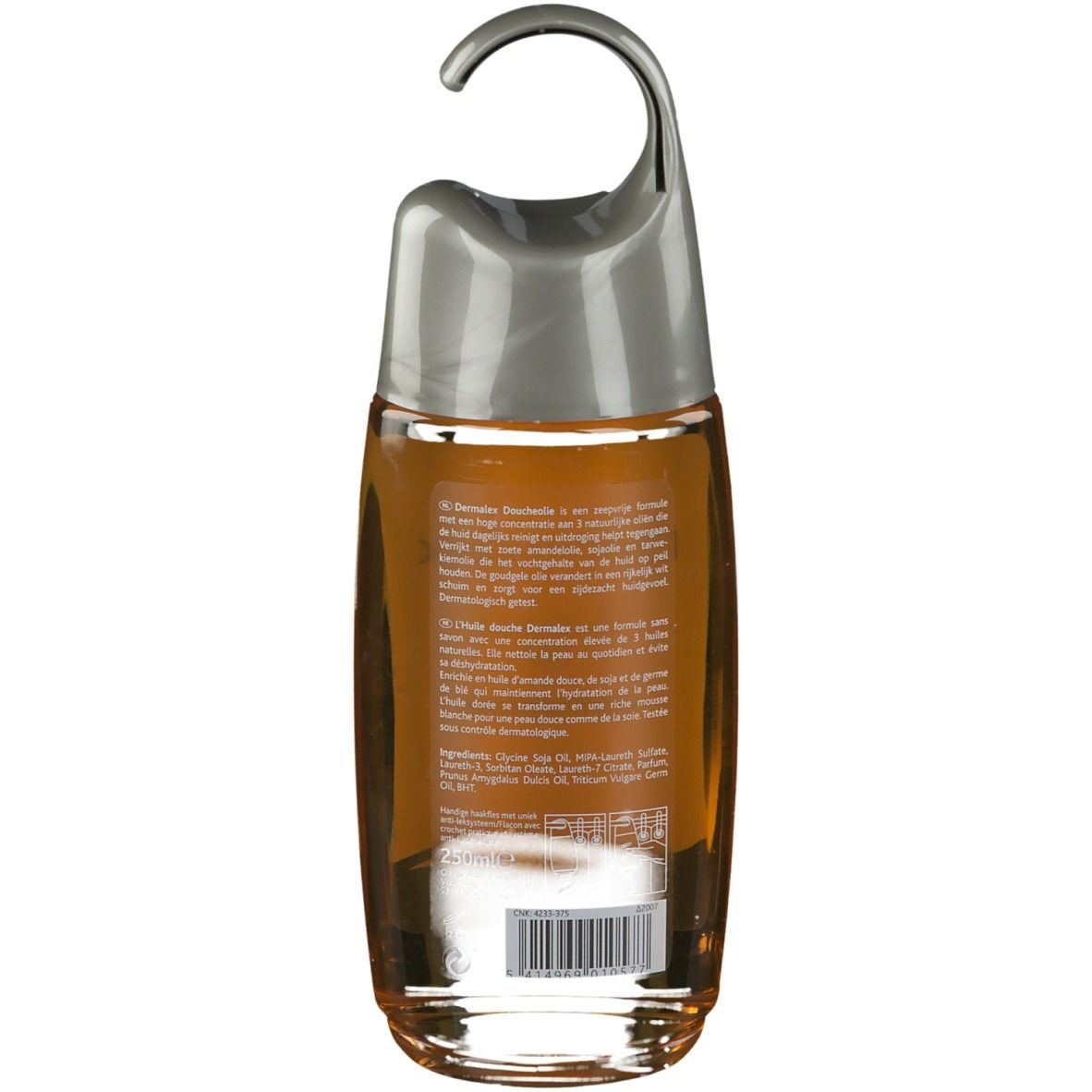 Achterkant van de douche-oliefles. Tekst in meerdere talen, barcode en ingrediënten. Transparante fles met gele vloeistof.