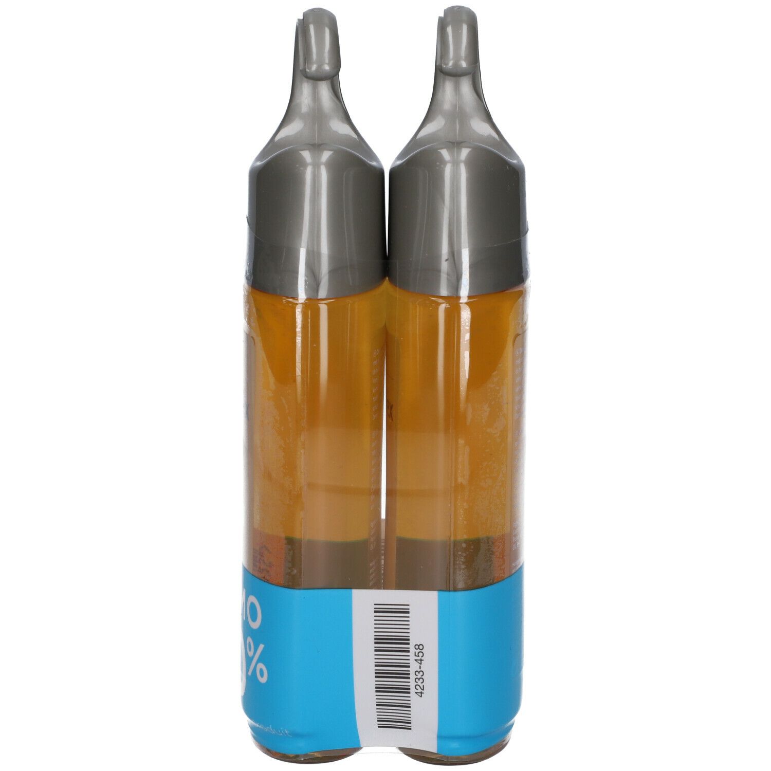 Twee Dermalex Shower Oil flessen in verpakking. Sticker met barcode en productinformatie. Transparante vloeistof.
