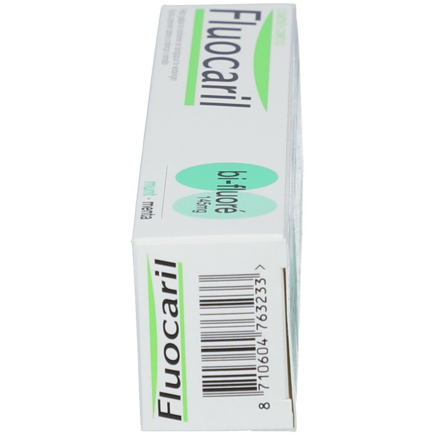 Zahnpasta-Schachtel. Weiß, grün. Aufschrift: Fluocaril, Bi-Fluoré 145mg, Minze. Barcode.