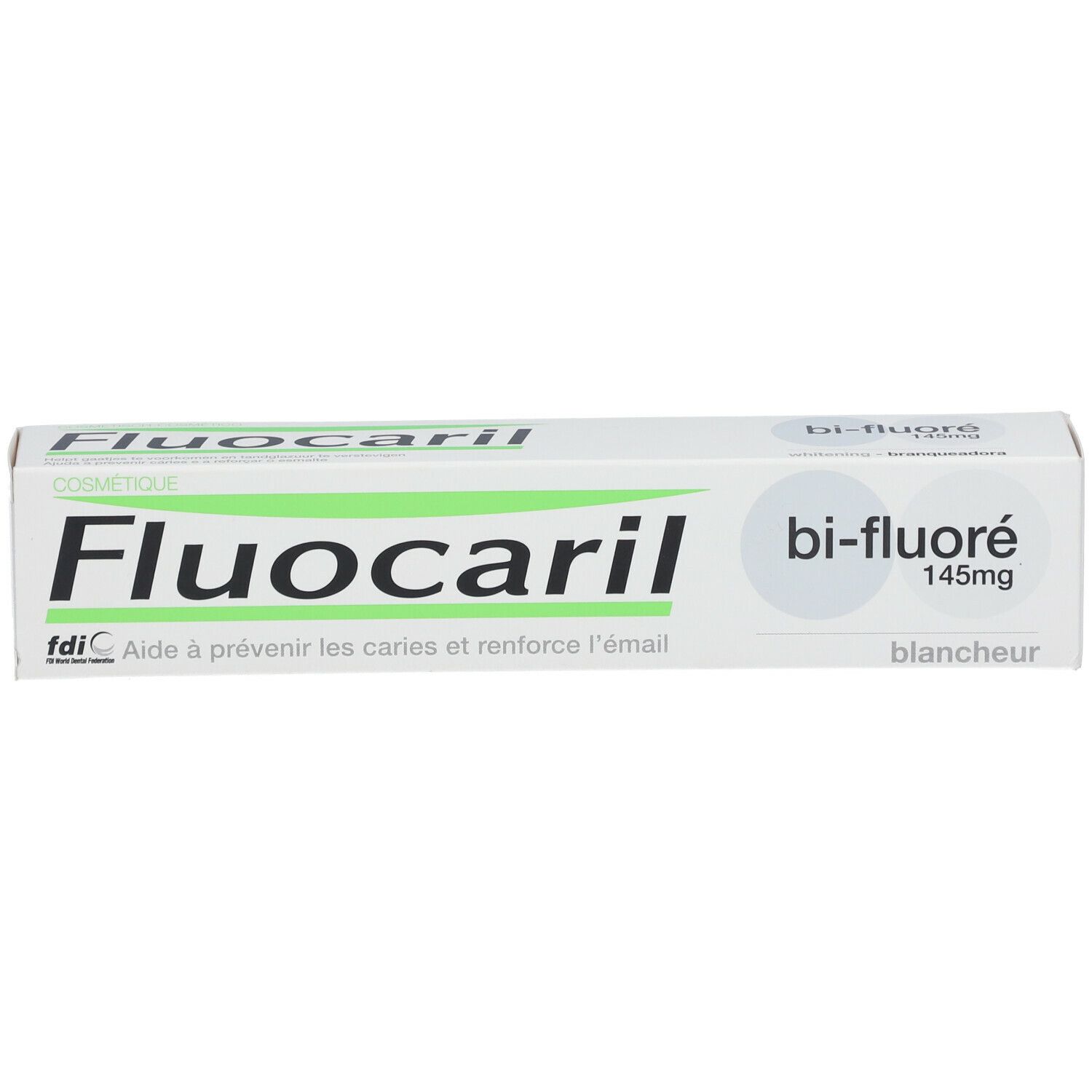 Zahnpasta-Schachtel, weiß, mit grünem und schwarzem Text. Aufschrift: Fluocaril, Bi-Fluoré 145mg.