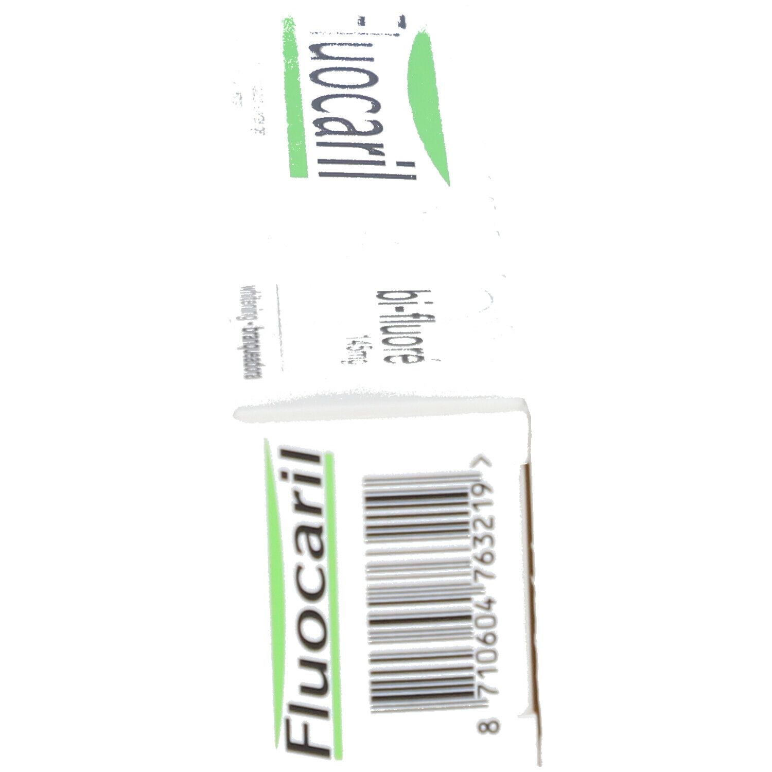 Zahnpasta-Schachtel, weiß, mit grünem und schwarzem Text. Aufschrift: Fluocaril, Bi-Fluoré 145mg.