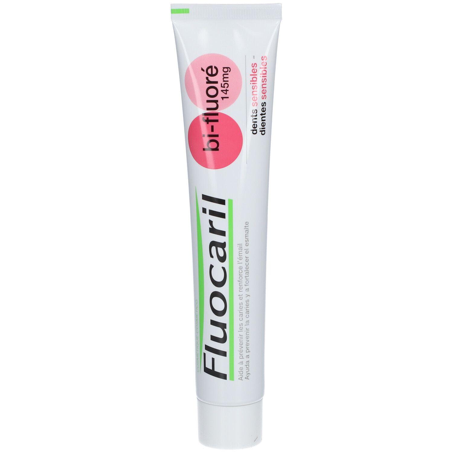 Tandpastatube. Opschrift: Fluocaril, Bi-Fluoré 145mg, Dents sensibles. Witte tube met roze en groene accenten.