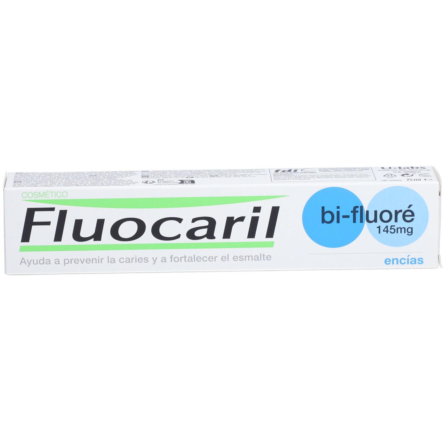 Emballage de dentifrice Fluocaril. Boîte blanche avec texte bleu et vert. Graphique bleu en forme de bulle.