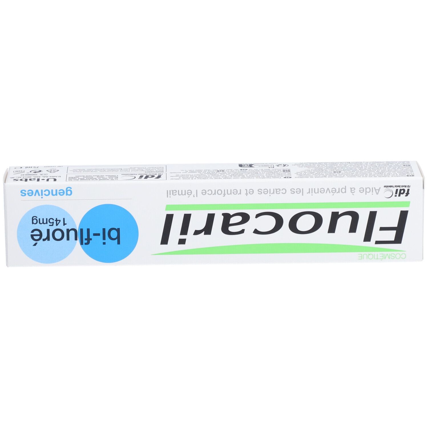 Emballage de dentifrice Fluocaril. Boîte blanche avec texte bleu et vert. Graphique bleu en forme de bulle.