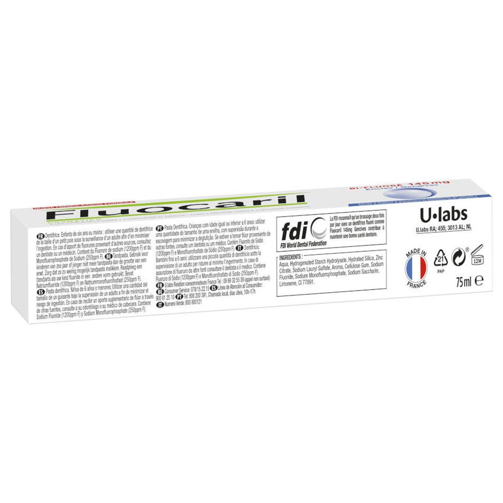 Dos de l'emballage du dentifrice. Texte multilingue. Logo fdiC. Ingrédients et informations du fabricant.
