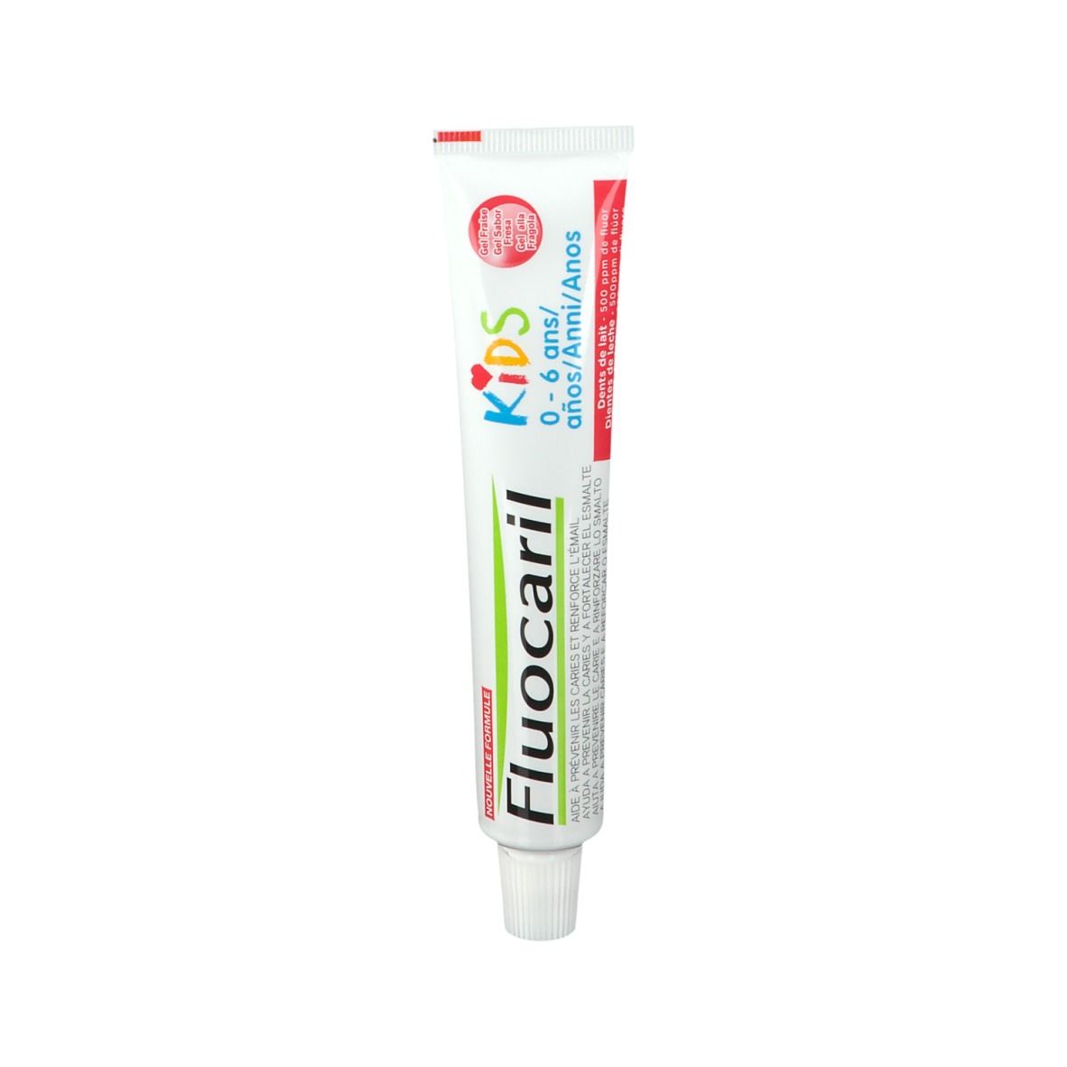 Tube de dentifrice pour enfants. Blanc, avec texte rouge et vert. Inscription : Fluocaril Kids 0-6 ans.