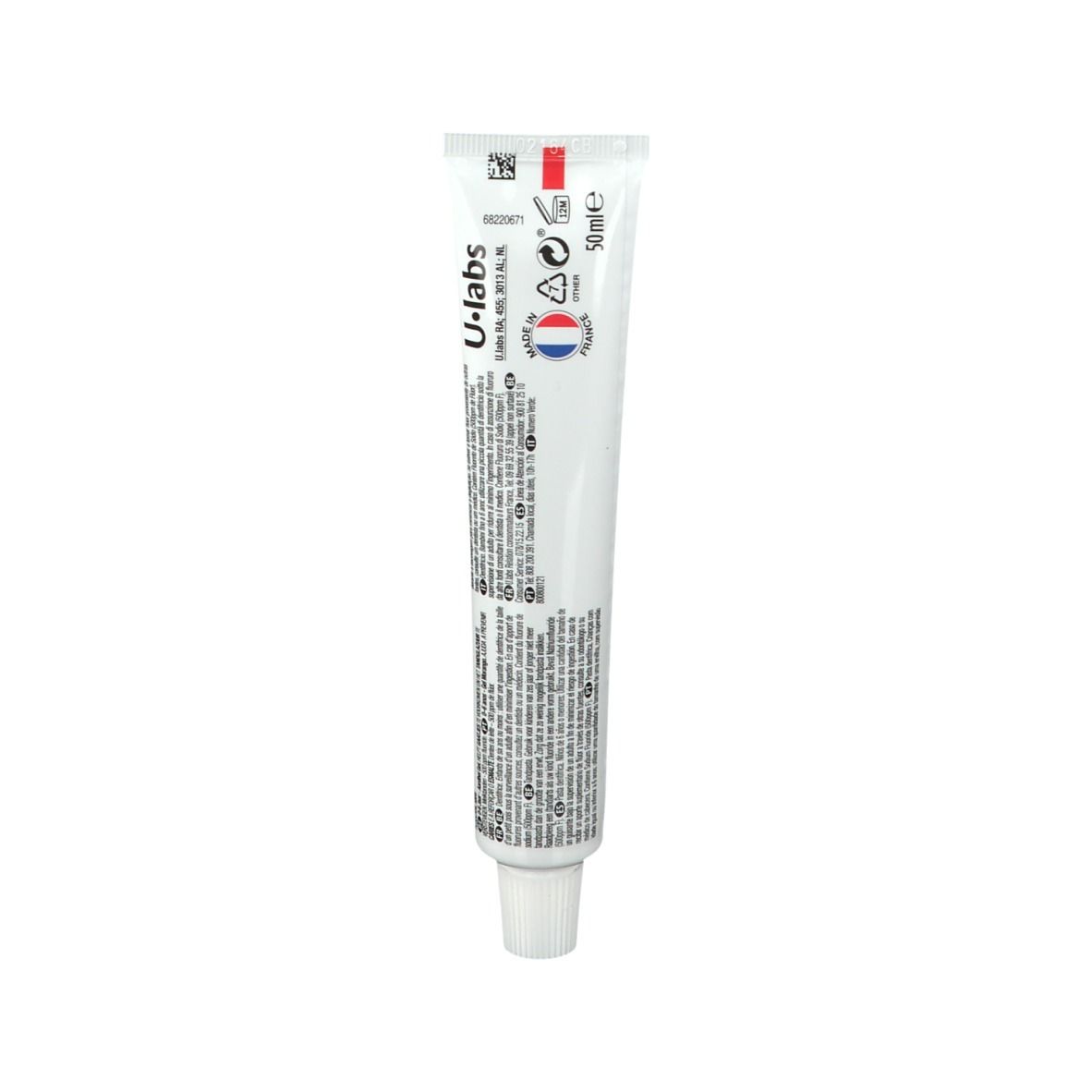 Tube de dentifrice. Blanc, avec texte rouge. Inscription : U-labs. Contient des informations et symboles.