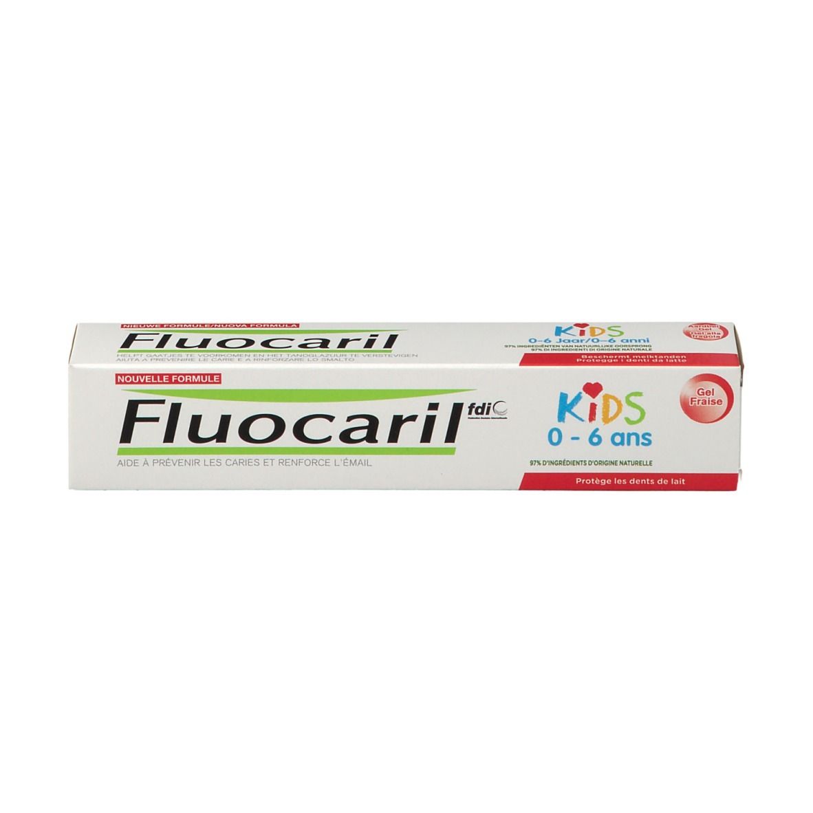 Boîte de dentifrice pour enfants. Blanc, avec texte rouge et vert. Inscription : Fluocaril Kids 0-6 ans.