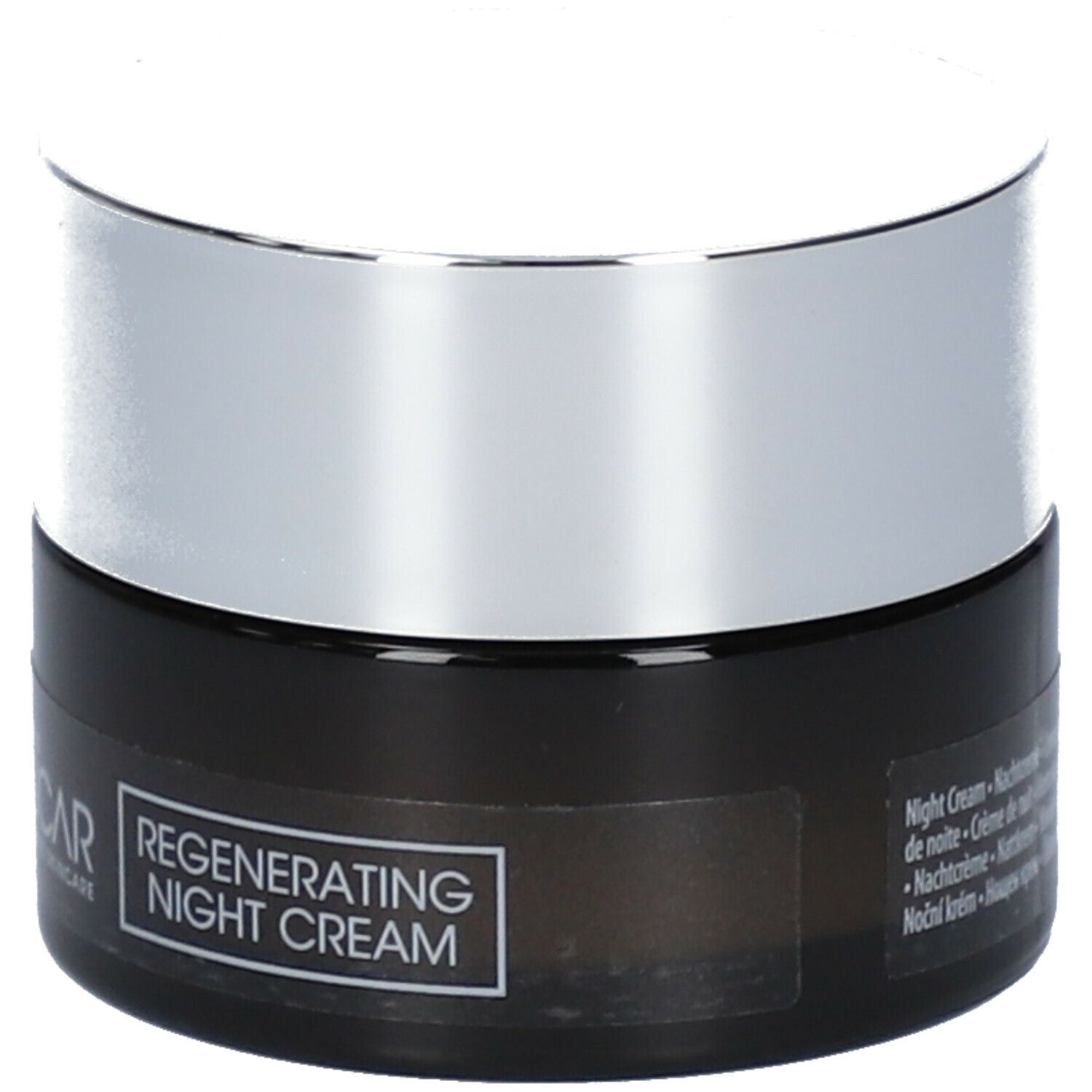 Dunkle Creme-Dose mit silbernem Deckel. Aufschrift: Remescar, Regenerating Night Cream.