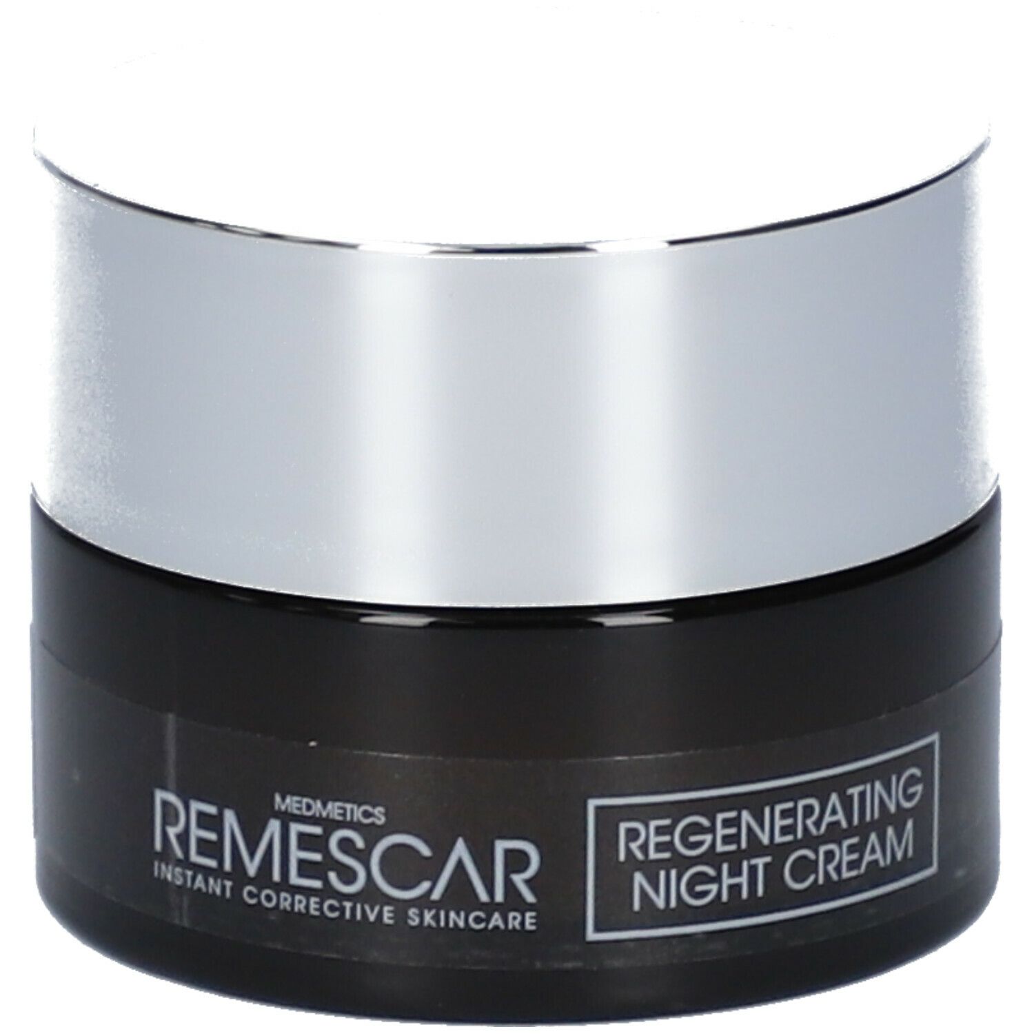 Dunkle Creme-Dose mit silbernem Deckel. Aufschrift: Remescar, Regenerating Night Cream.