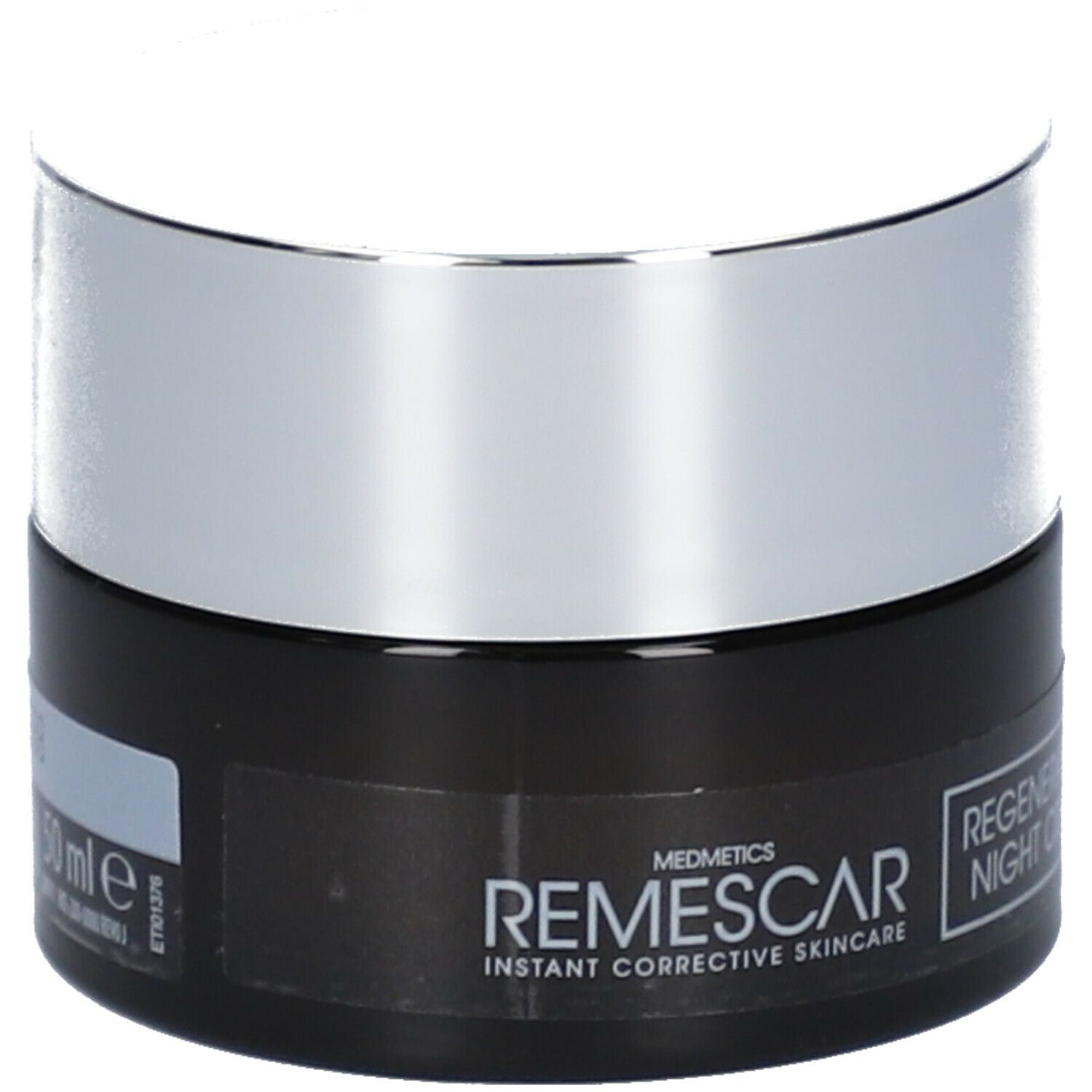 Dunkle Creme-Dose mit silbernem Deckel. Aufschrift: Remescar, Regenerating Night Cream, 50 ml.