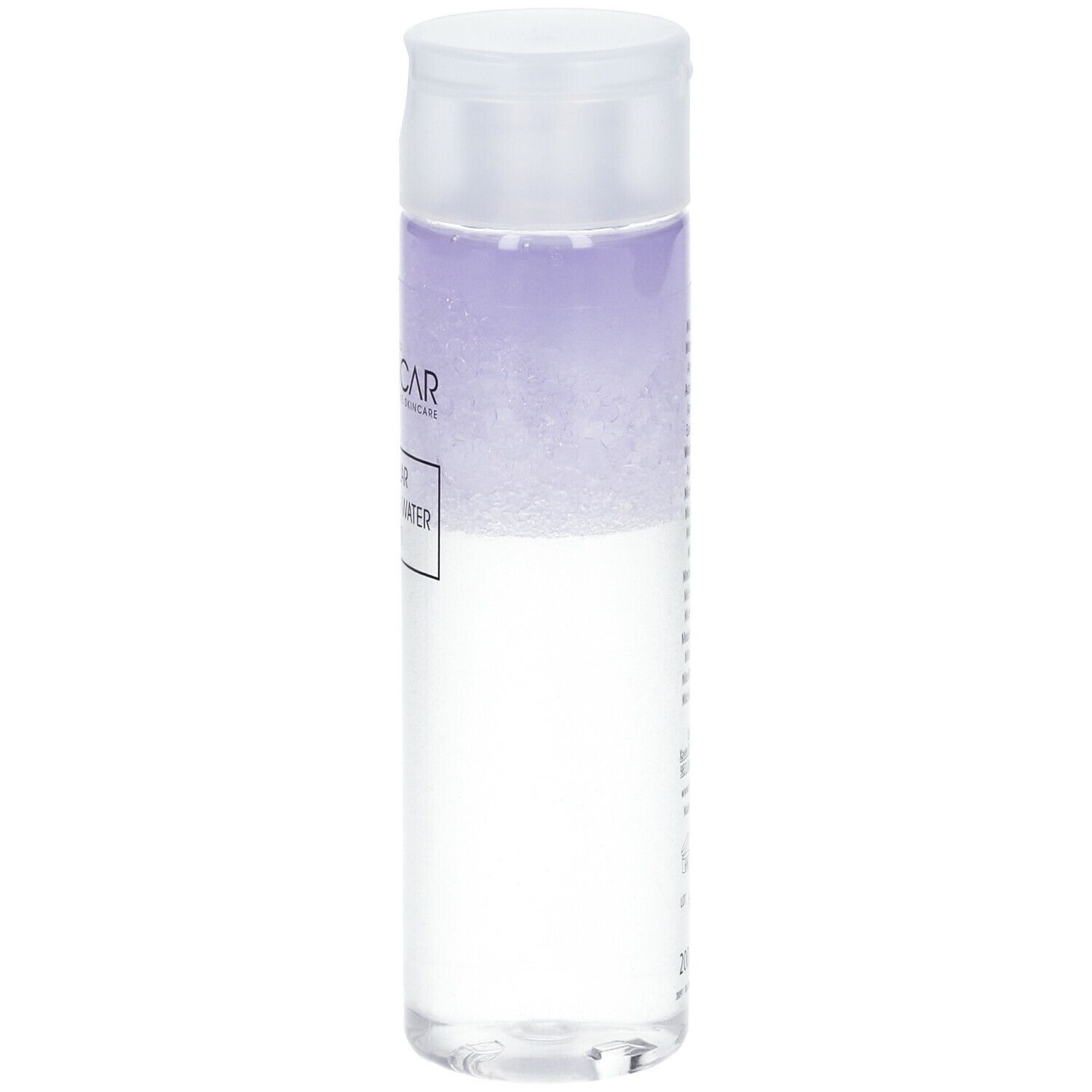Transparante fles met witte dop. Vloeistof met paarse tint. Productnaam en merk op het etiket.