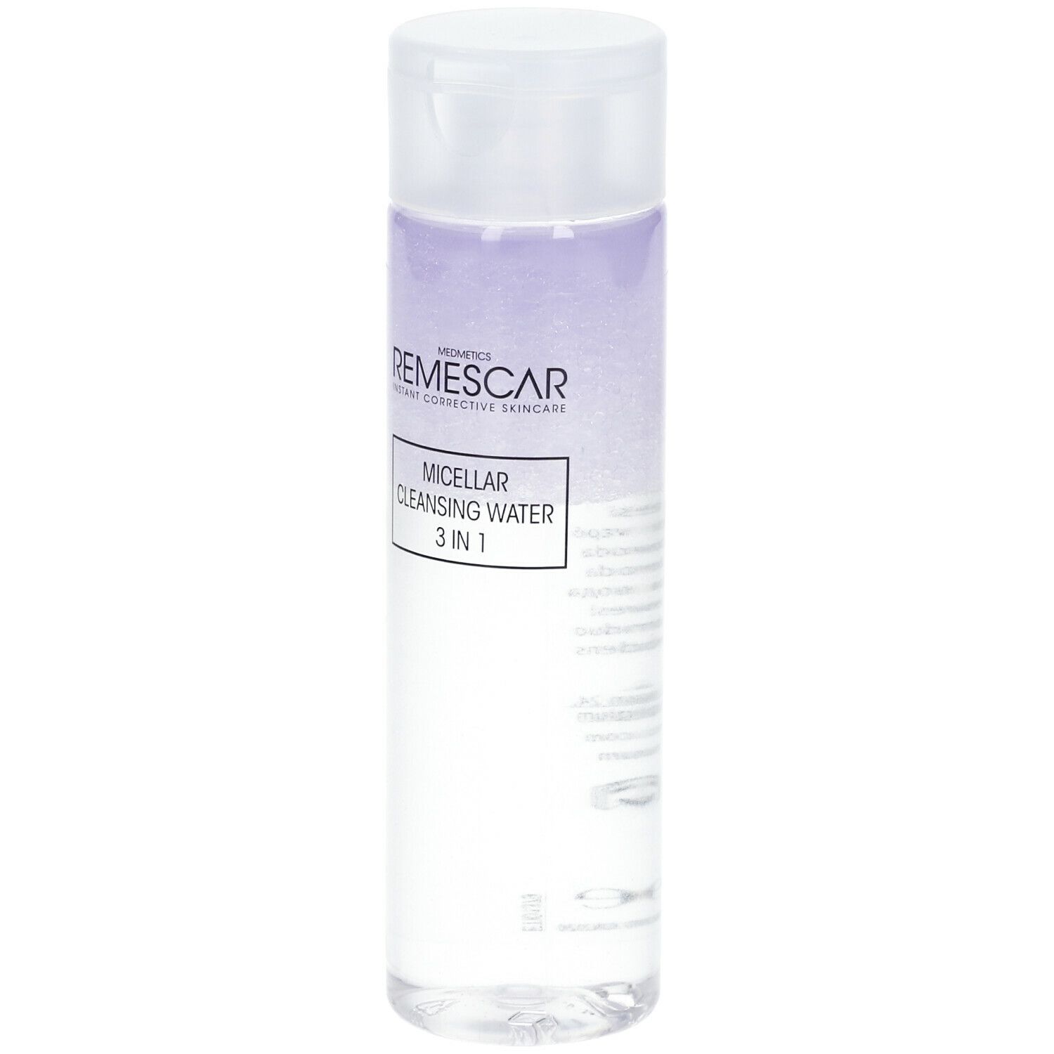 Transparante fles met witte dop. Label met productnaam en merk. Vloeistof met paarse tint.