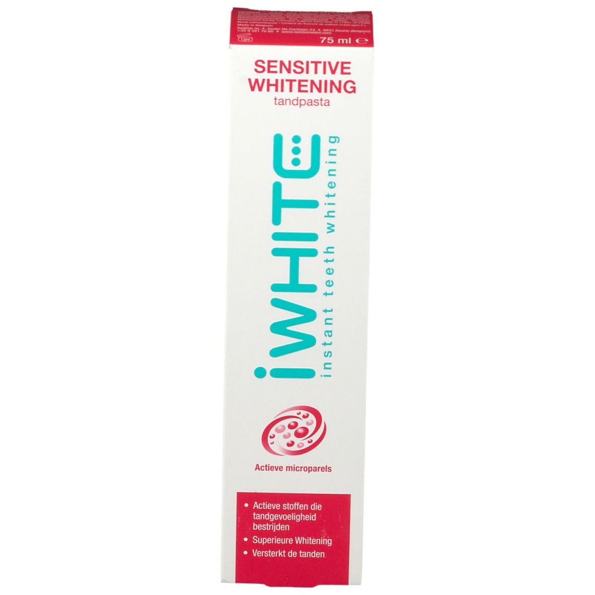 Emballage du dentifrice. Inscription : iWhite, Sensitive Whitening, Active Micropearls. Texte en rouge.