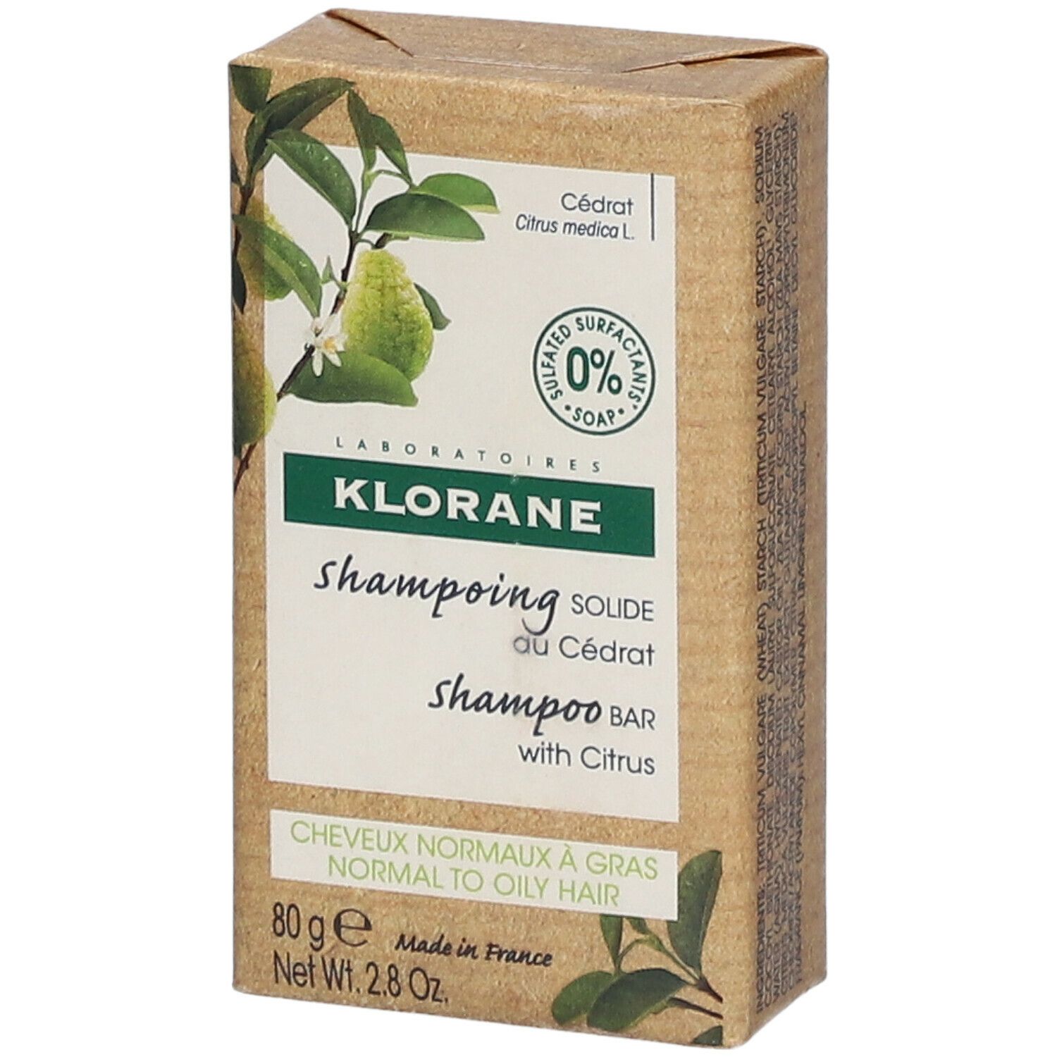Kartonnen verpakking van Klorane Shampoo Bar. Productinformatie en citroenillustraties.