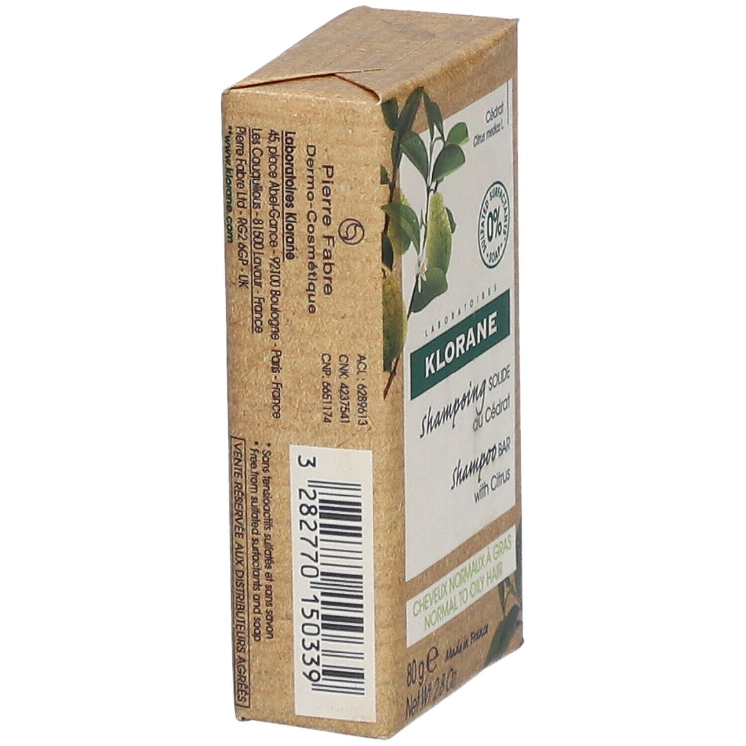 Zijkant van de Klorane Shampoo Bar verpakking. Productinformatie en barcode.