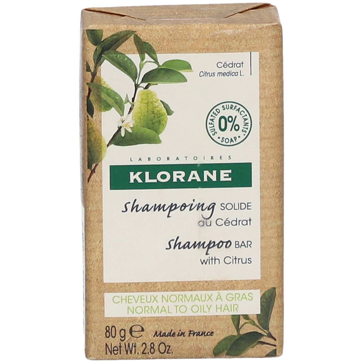 Vooraanzicht van de Klorane Shampoo Bar verpakking met productnaam en illustraties.