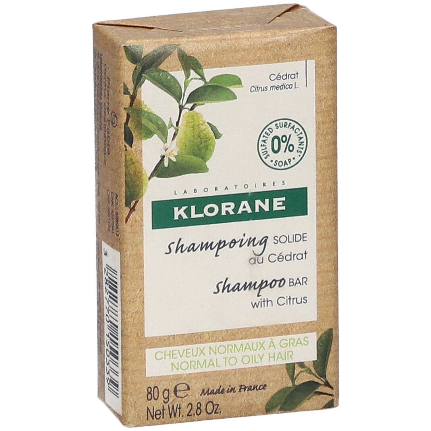 Vooraanzicht van de Klorane Shampoo Bar verpakking met productnaam en illustraties.