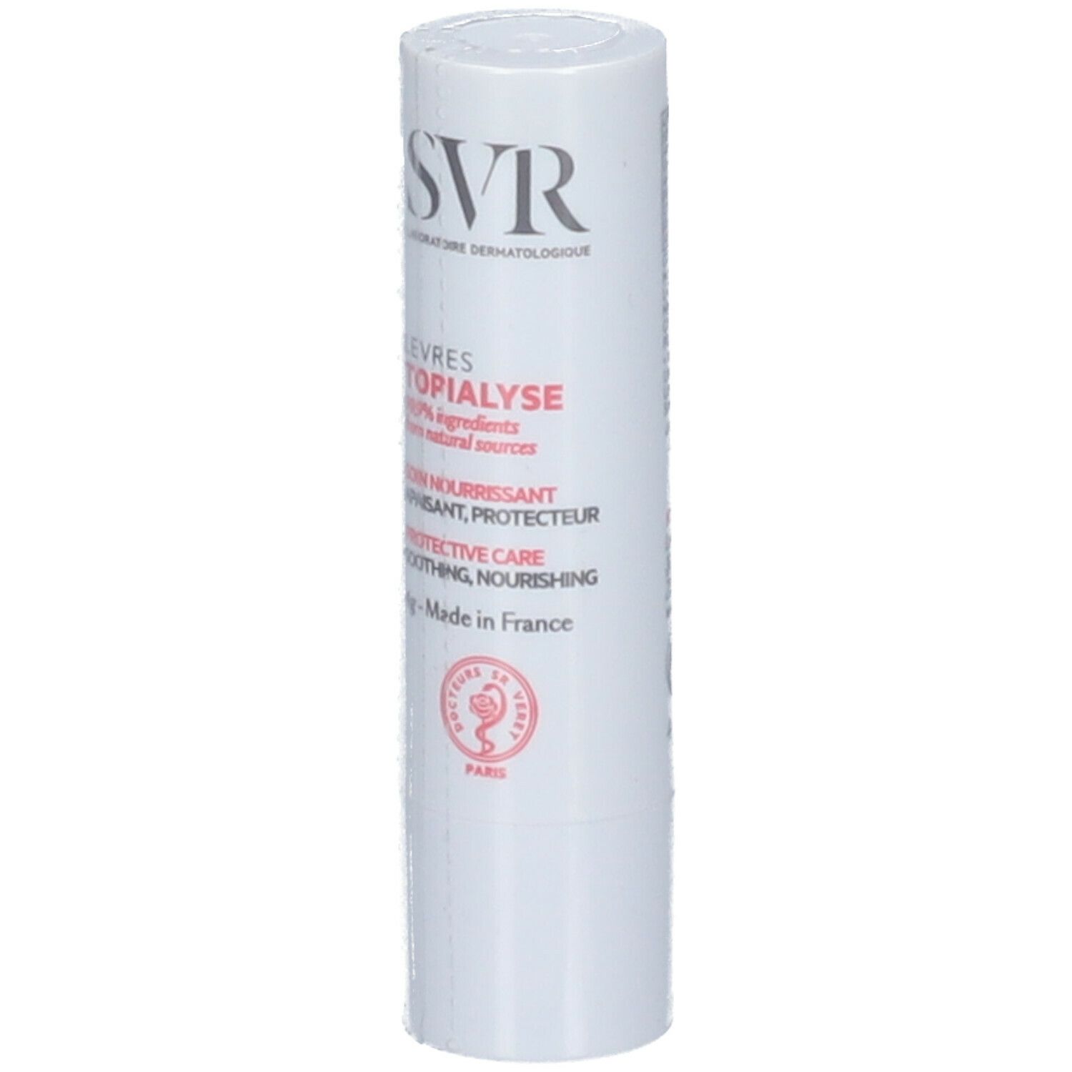 Stick à lèvres blanc avec texte rouge et noir. SVR en haut, LEVRES TOPIALYSE en dessous.