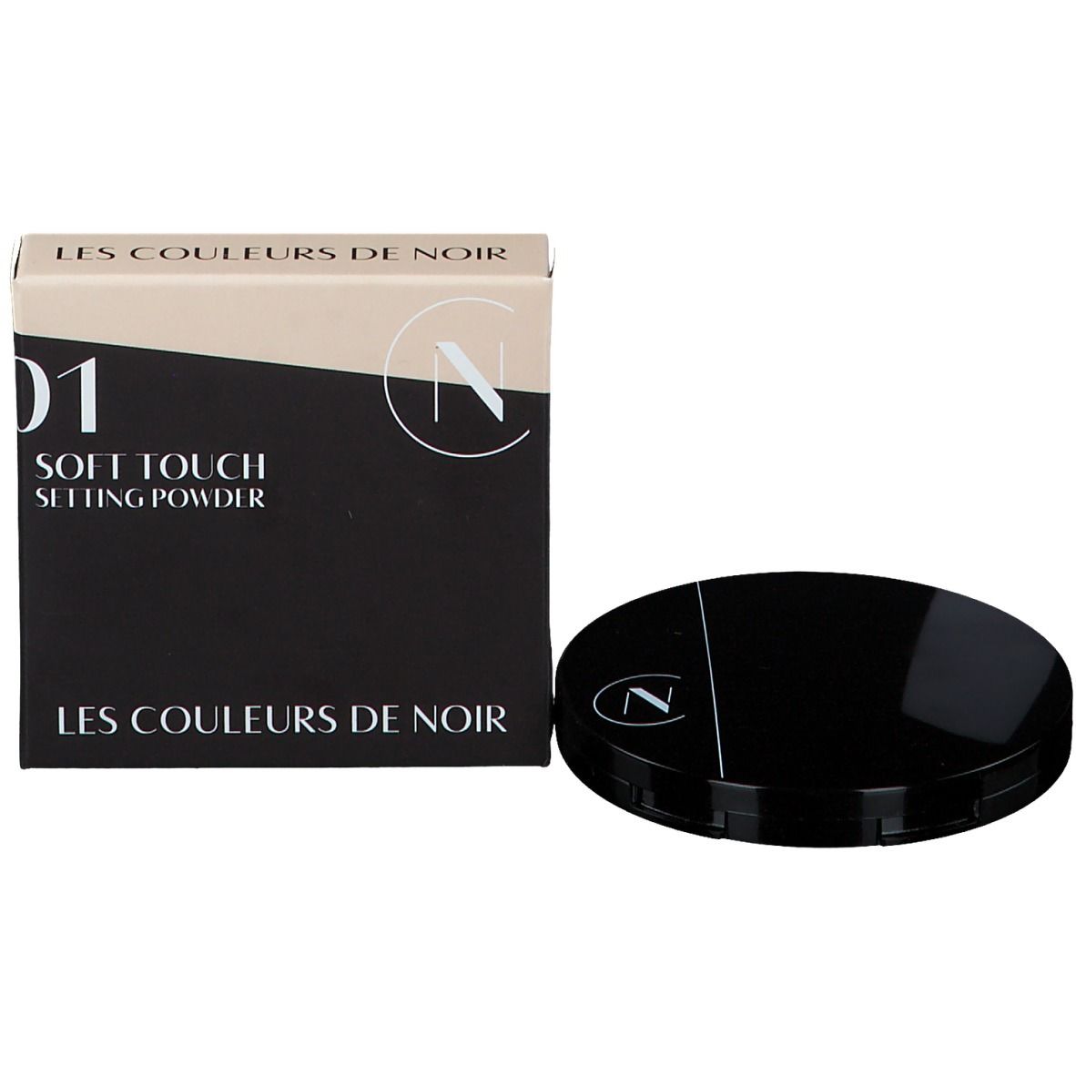 Zwarte doos en ronde houder. Op de doos: Les Couleurs de Noir, Soft Touch Setting Powder.