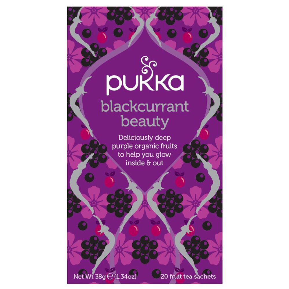 Pukka Blackcurrant Beauty thé. Emballage violet avec motif floral. Texte: Blackcurrant Beauty, organic, 20 sachets.