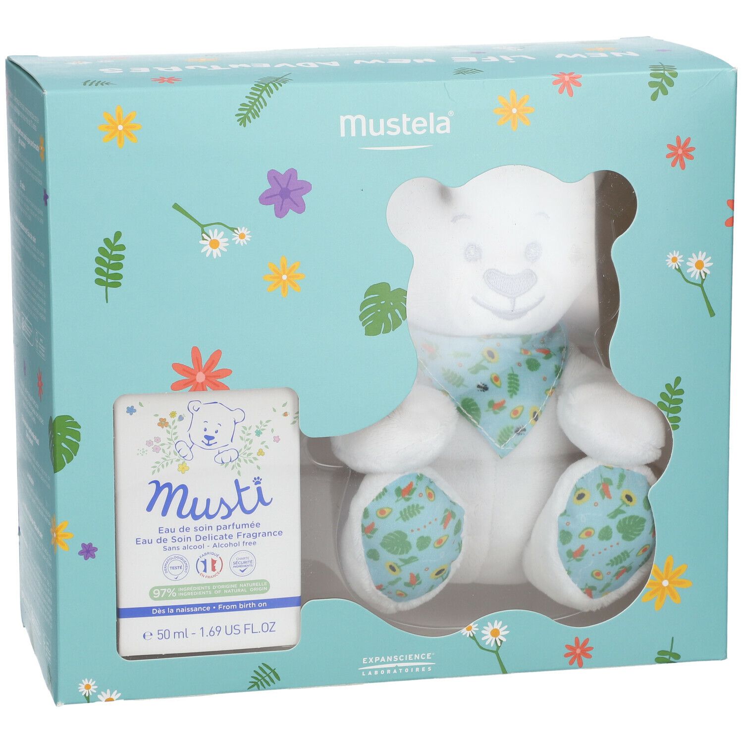Mustela Musti Set mit Teddybär und Parfum. Hellblaue Verpackung mit Blumen. Der Bär hat ein Halstuch und die Verpackung enthält Parfum.