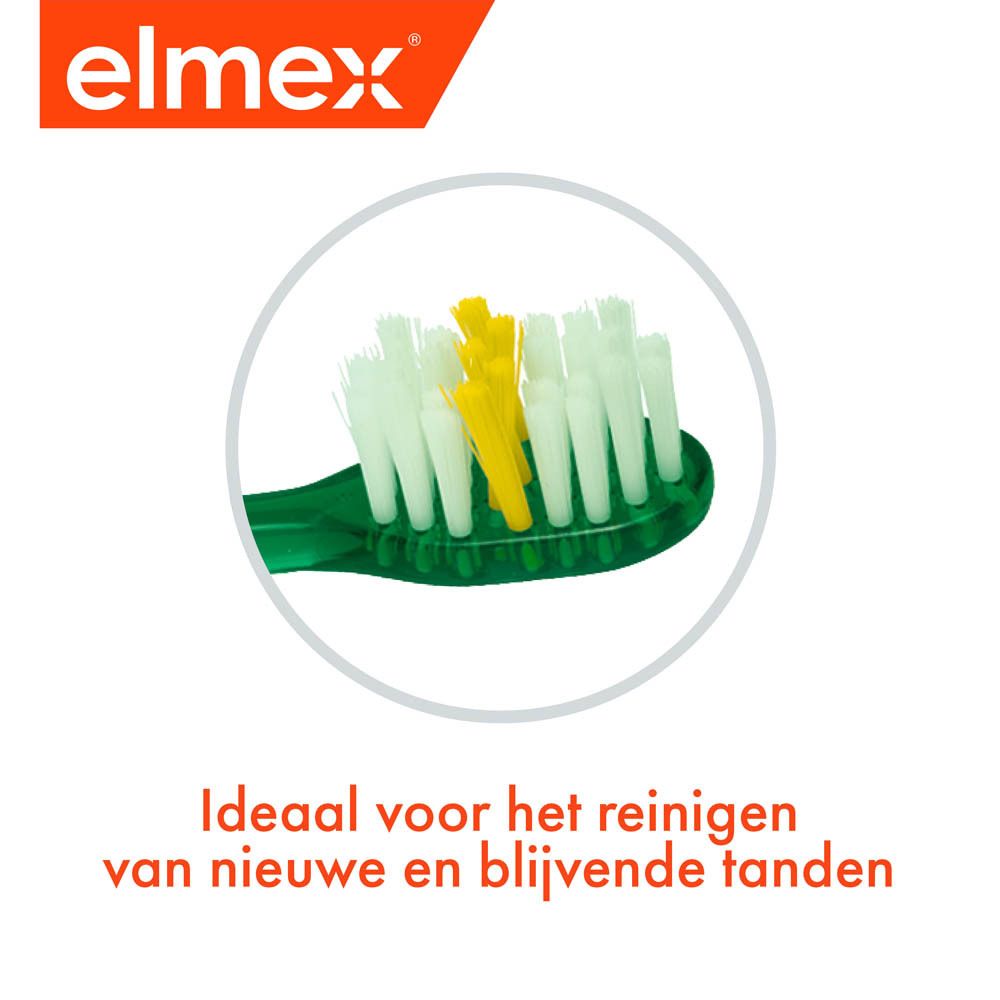 Close-up van de borstelkop. Opschrift: elmex. Tekst: Ideaal voor het reinigen van nieuwe en blijvende tanden.