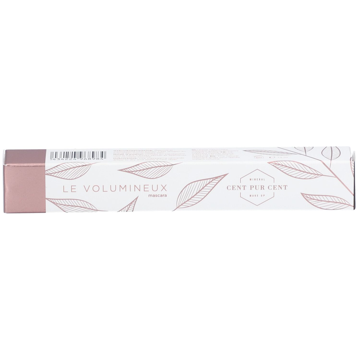 Emballage de mascara. Blanc avec accents roses et motif de feuilles. Inscription : LE VOLUMINEUX, Mascara, CENT PUR CENT.