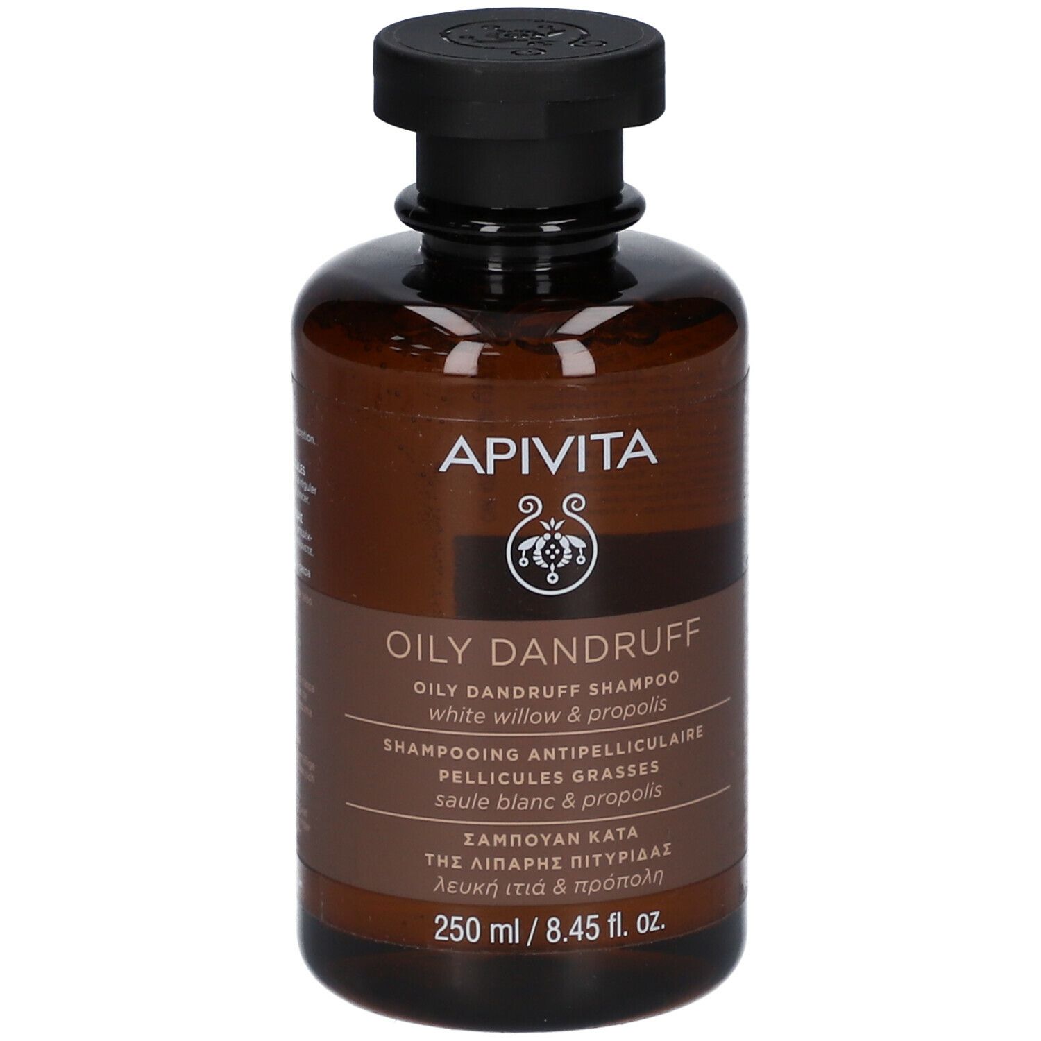 Bruine fles met zwarte dop. Opschrift: APIVITA, OILY DANDRUFF Shampoo. Meertalige productinformatie.