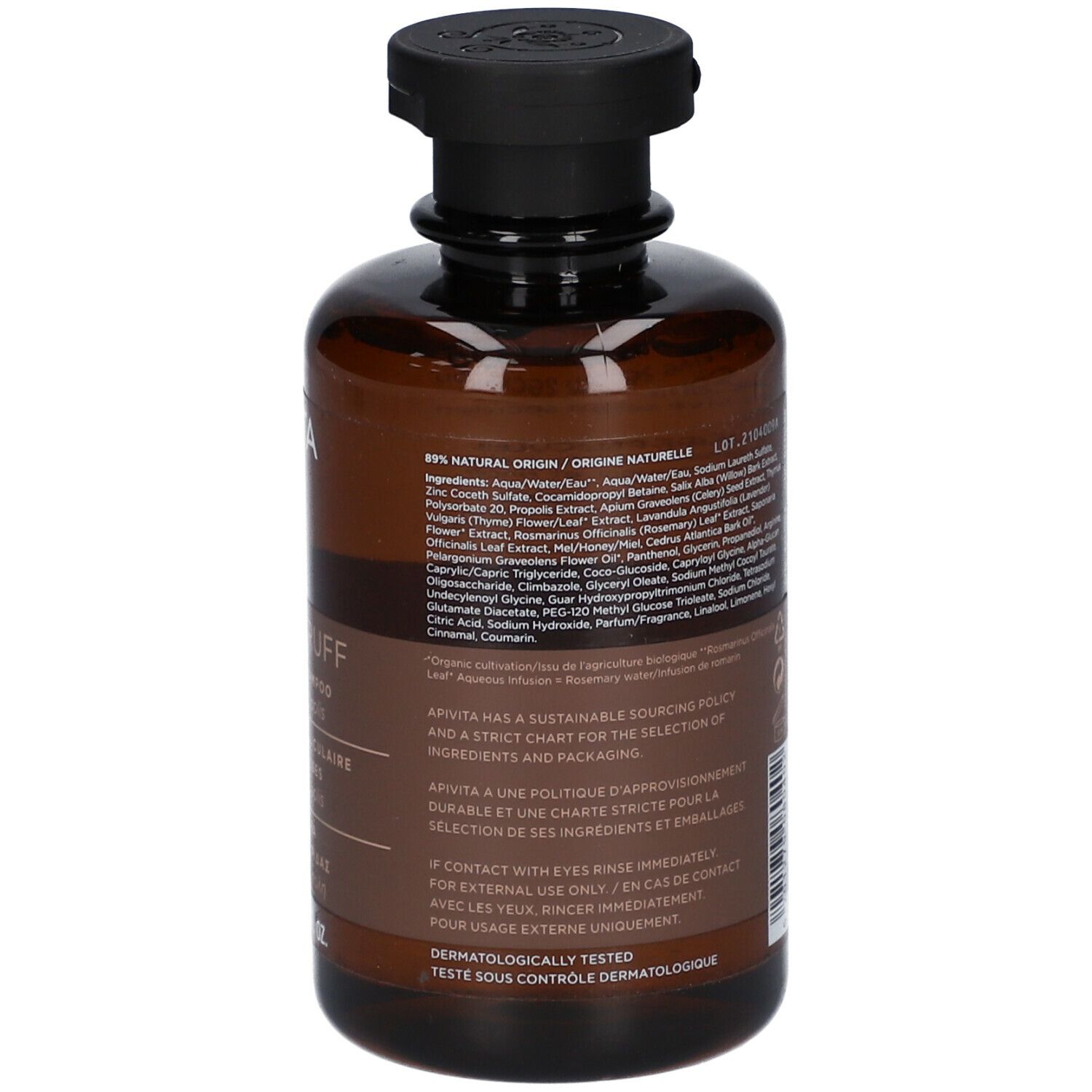 Achterkant van een bruine fles met zwarte dop. Meertalige productinformatie, ingrediënten en certificeringen.