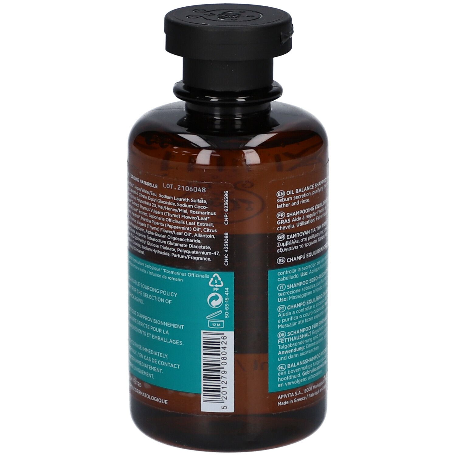 Rückseite der braunen Flasche mit schwarzem Deckel. Text in mehreren Sprachen. Aufschrift: Oil Balance Shampoo.