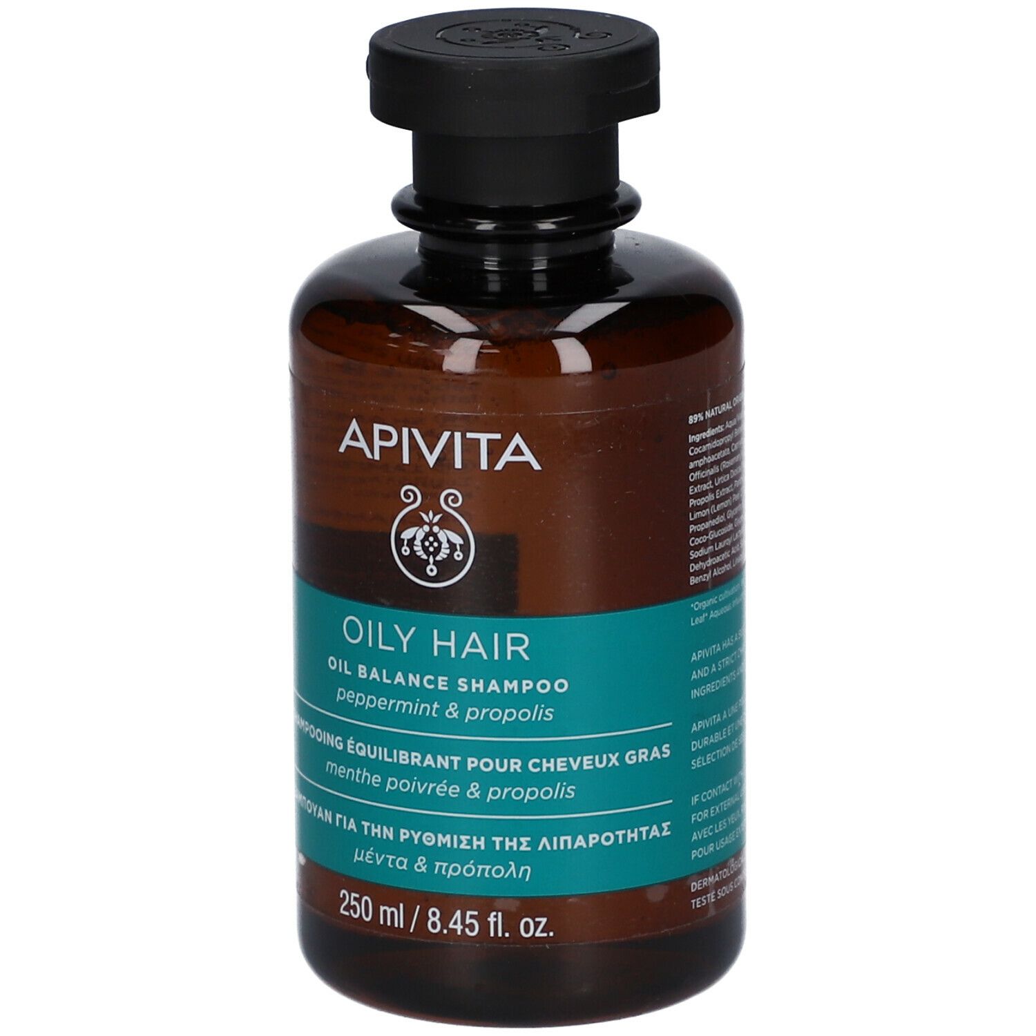 Braune Flasche mit schwarzem Deckel. Aufschrift: APIVITA, OILY HAIR, Oil Balance Shampoo, Pfefferminze & Propolis.