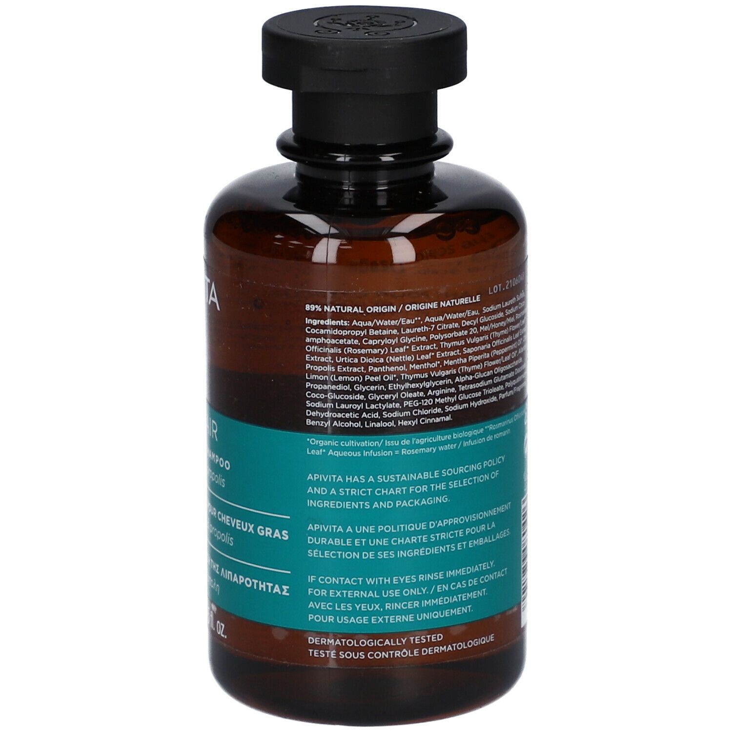 Rückseite der braunen Flasche mit schwarzem Deckel. Text in mehreren Sprachen. Aufschrift: Oil Balance Shampoo.