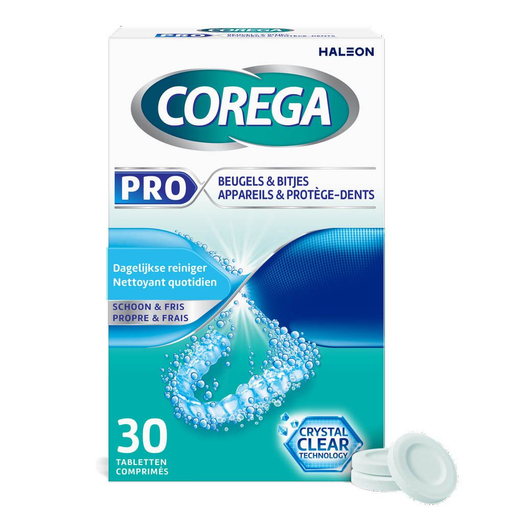 Corega Pro verpakking met 30 tabletten en drie tabletten ernaast. Opschrift: Beugels & Bitjes, Appareils & Protège-dents.