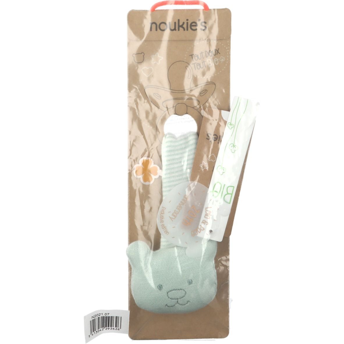 Chaîne de sucette dans son emballage. Sucette rayée vert et blanc avec tête d'ours. Carton brun avec sachet transparent.