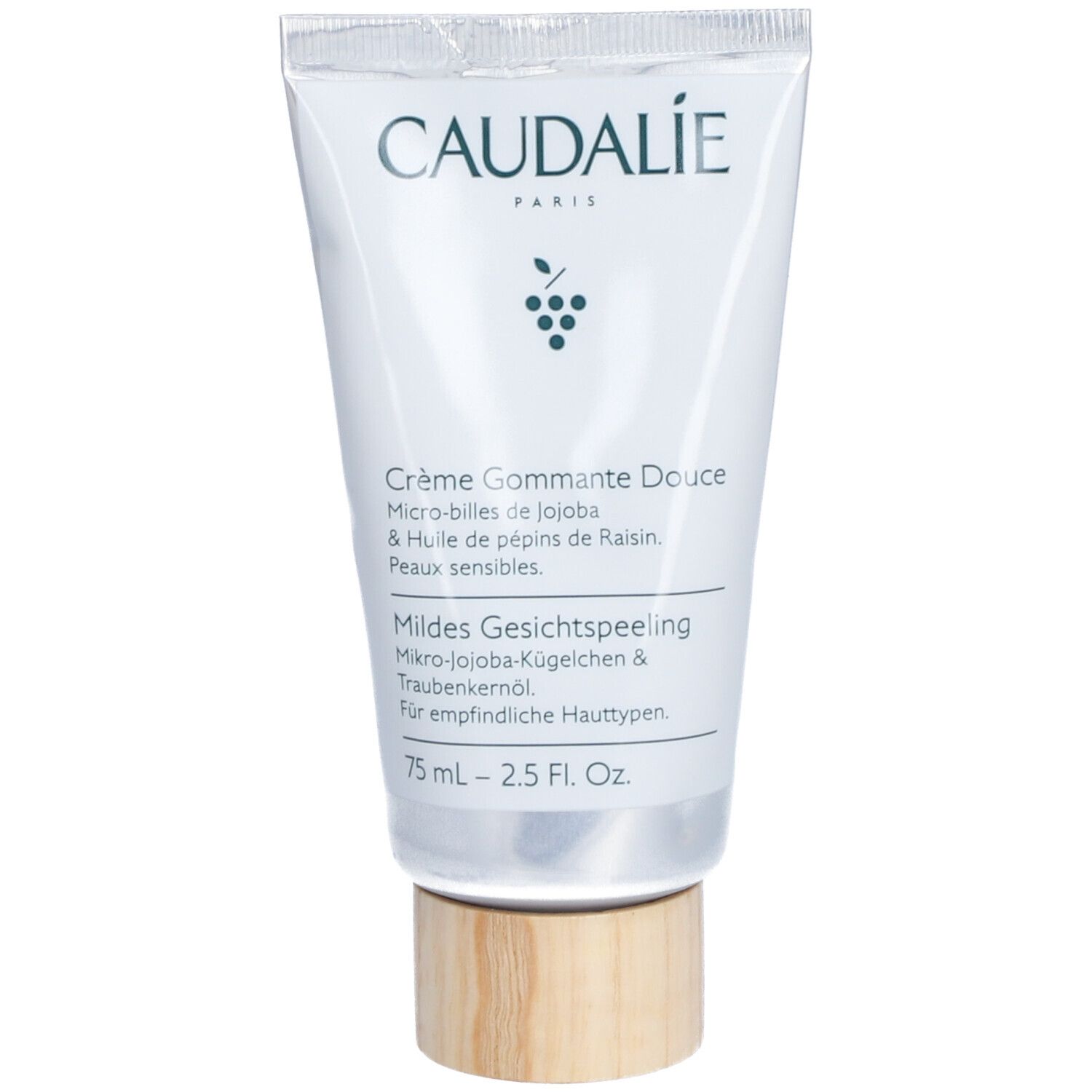 Weiße Tube mit CAUDALIE-Logo und Produktbezeichnung. Holzfarbener Verschluss. Text: Crème Gommante Douce.
