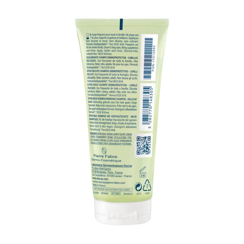 Dos du tube de shampooing. Texte multilingue. Code QR et informations fabricant.