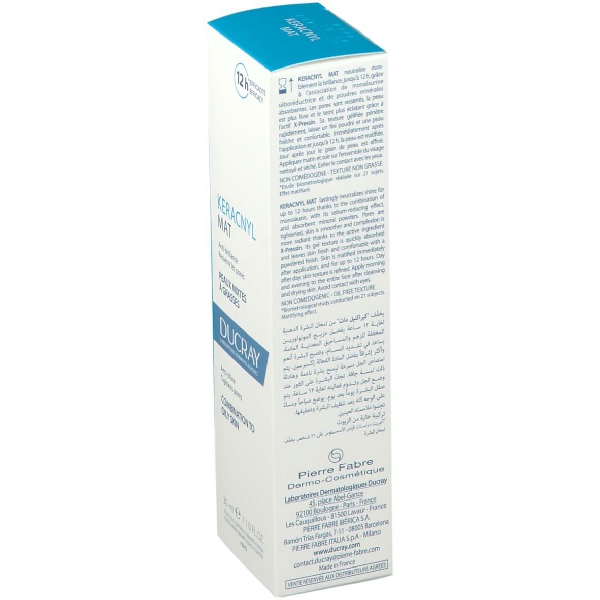 Boîte pliante blanche et bleue. Texte en plusieurs langues. Marque: DUCRAY. Contient des informations sur le produit et les ingrédients.