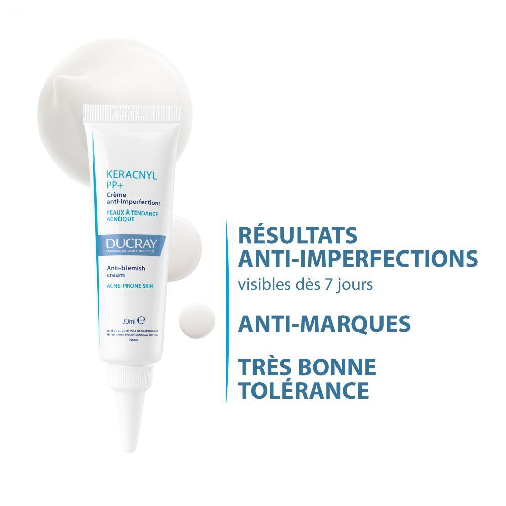 Tube avec nom du produit et de la marque. Blanc et bleu. 30 ml. Crème et gouttes.