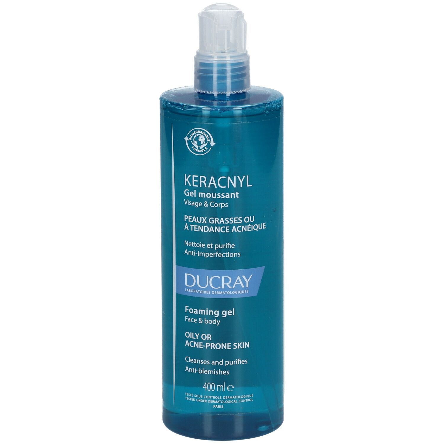Blauwe transparante fles met witte pomp. Opschrift: KERACNYL Gel moussant, voor vette of acne-gevoelige huid. Merk: DUCRAY.