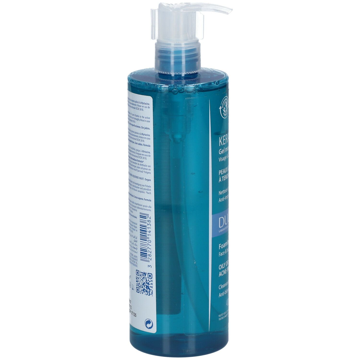 Blauwe transparante fles met witte pomp. Achterkant met tekst. Merk: DUCRAY. Opschrift: KERACNYL Gel moussant, voor vette of acne-gevoelige huid.
