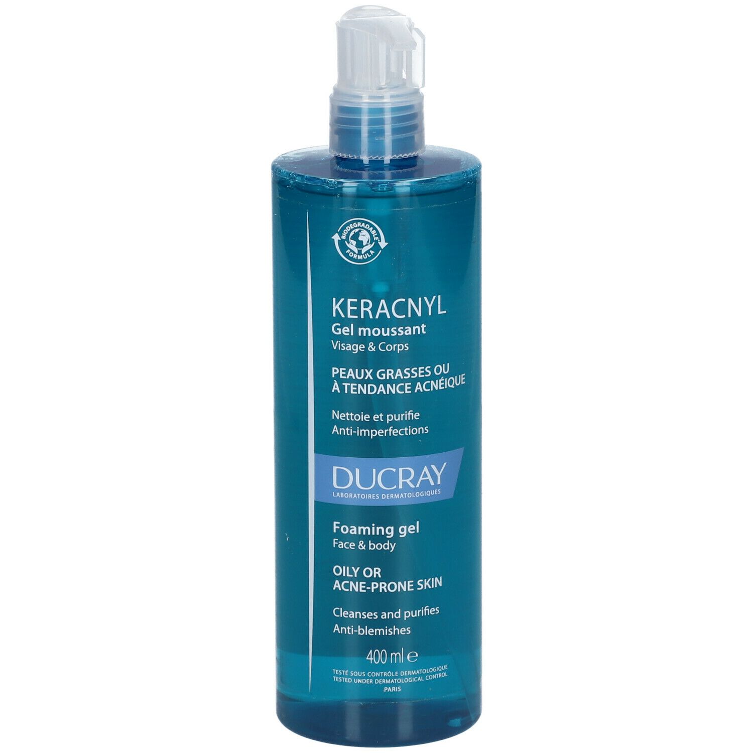 Blauwe transparante fles met witte pomp. Opschrift: KERACNYL Gel moussant, voor vette of acne-gevoelige huid. Merk: DUCRAY.