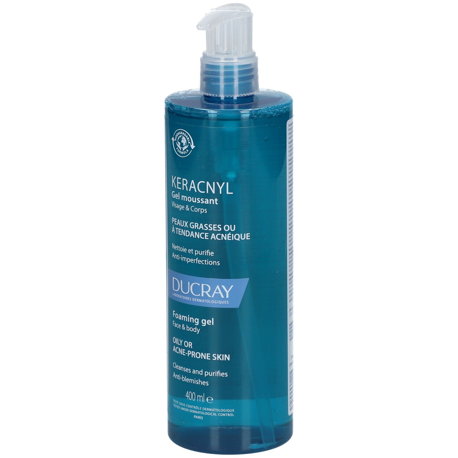 Blauwe transparante fles met witte pomp. Opschrift: KERACNYL Gel moussant, voor vette of acne-gevoelige huid. Merk: DUCRAY.