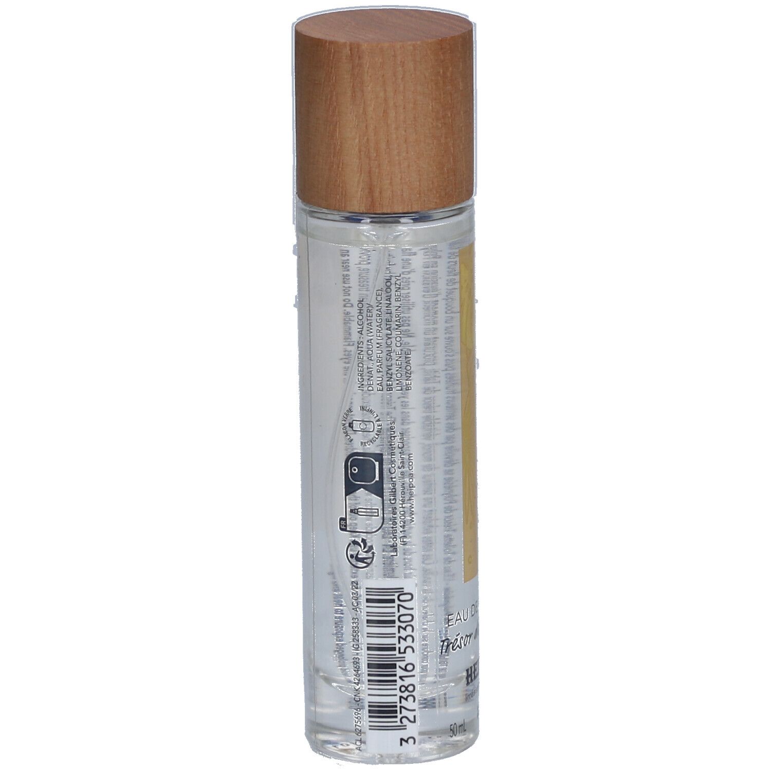 Flacon cylindrique avec bouchon en bois. Inscription: Eau de Toilette Trésor de Polynésie. Marque: Hei Poa.