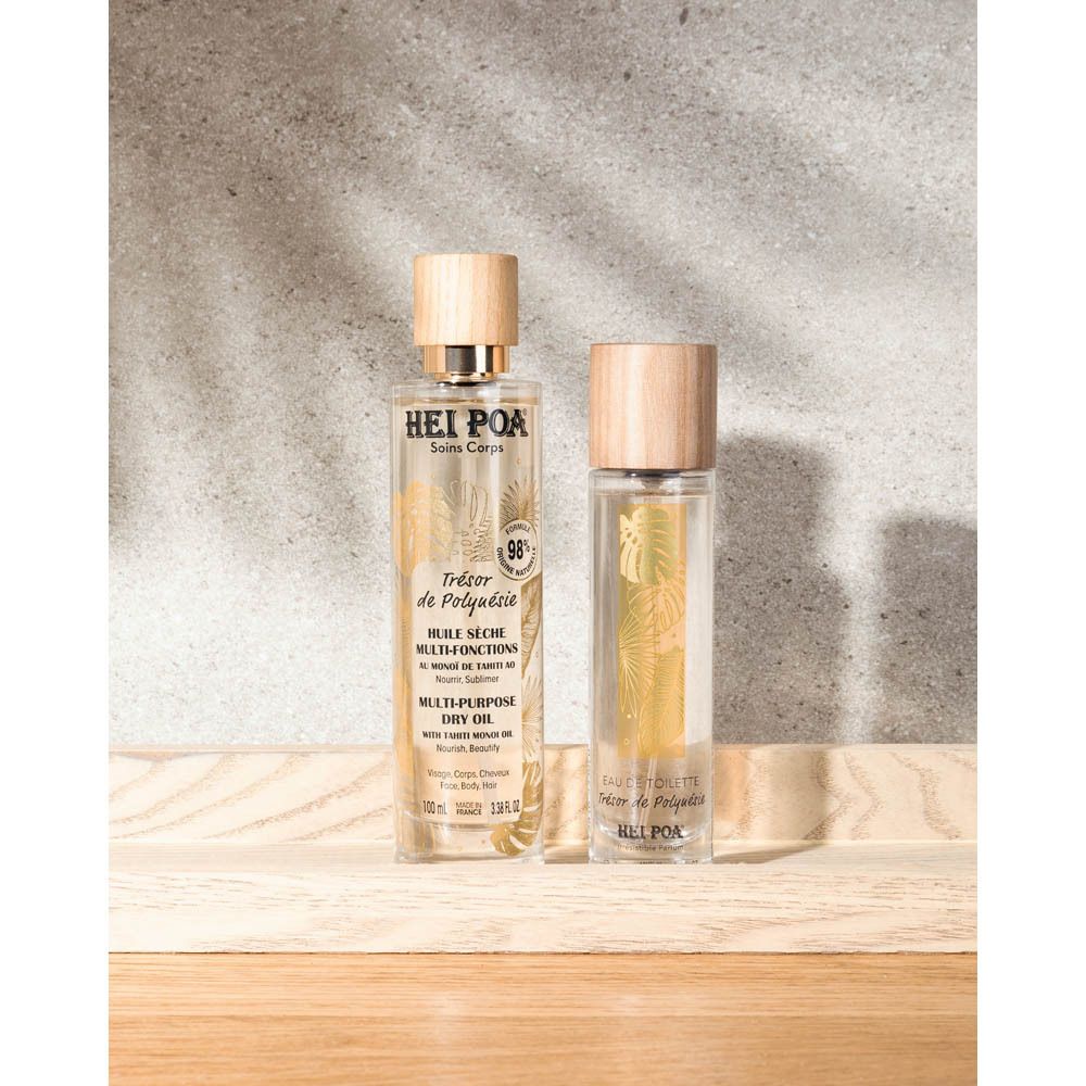 Deux flacons sur bois. À gauche: huile. À droite: eau de toilette. Marque: Hei Poa.